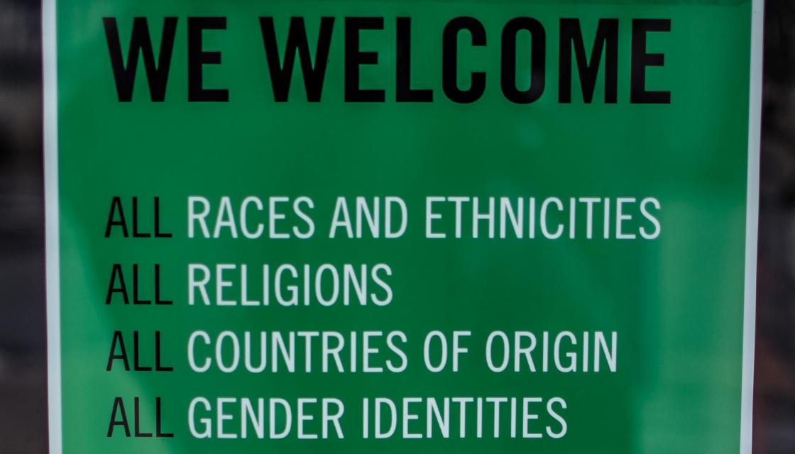 Sign saying we welcome all races and ethnicities